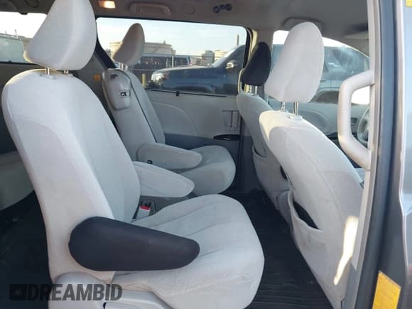 ✅ 2012 Toyota Sienna LE • VIN: 5TDKK3DC8CS240083 • Lot: 43556901. Listed on IAAI with 169,377 mi. Free auction sales archive from the USA and detailed vehicle history report at DreamBid. Image 8.