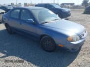 ✅ 2002 Kia Spectra GS • VIN: KNAFB161025084382 • Lot: 42726263. Listed on IAAI with 111,912 mi. Free auction sales archive from the USA and detailed vehicle history report at DreamBid. Image 1.