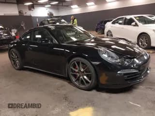 ✅ 2015 Porsche 911 Carrera S • VIN: WP0AB2A99FS124224 • Lot: 41955634. Listed on IAAI with 54,372 mi. Free auction sales archive from the USA and detailed vehicle history report at DreamBid. Image 1.