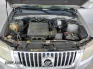 ✅ 2010 Mercury Mariner Premier • VIN: 4M2CN8HG2AKJ00812 • Lot: 61412784. Wystawiony na Copart z przebiegiem 215 509 mil. Bezpłatny archiwum sprzedaży aukcyjnych z USA i szczegółowy raport historii pojazdu na DreamBid. Zdjęcie 12.