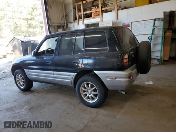 ✅ 2000 Toyota RAV4 • VIN: JT3HP10V4Y0232794 • Lot: 84278185. Listed on Copart with 243,884 mi. Free auction sales archive from the USA and detailed vehicle history report at DreamBid. Image 2.