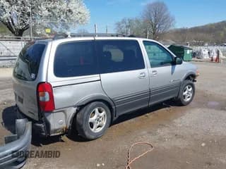 ✅ 2004 Pontiac Montana • VIN: 1GMDU03E94D189934 • Lot: 41968925. Wystawiony na IAAI z przebiegiem 143 411 mil. Bezpłatny archiwum sprzedaży aukcyjnych z USA i szczegółowy raport historii pojazdu na DreamBid. Zdjęcie 4.