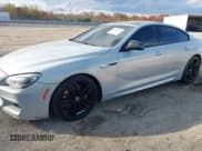 ✅ 2015 BMW 6 Series 650i • VIN: WBA6B2C5XFD799355 • Lot: 43664300. Listed on IAAI with 125,050 mi. Free auction sales archive from the USA and detailed vehicle history report at DreamBid. Image 2.