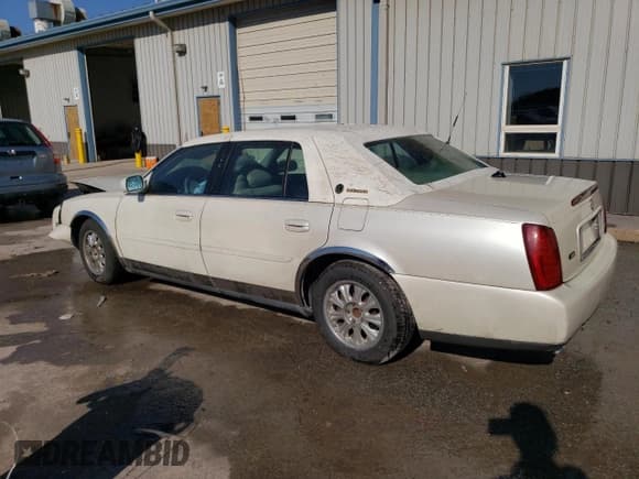 ✅ 2003 Cadillac DeVille • VIN: 1G6KD54Y63U278279 • Lot: 75392814. Listed on Copart with 106,130 mi. Free auction sales archive from the USA and detailed vehicle history report at DreamBid. Image 2.