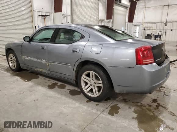 2006 Dodge Charger R/T with VIN 2B3KA53H76H148284, listed as a Copart auction lot 82766825 with 241,172 mi miles and Salvage title. Bid and sale history available at DreamBid. Image 2.