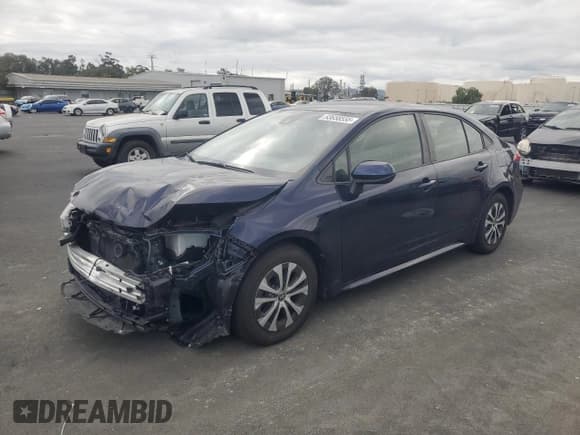 ✅ 2022 Toyota Corolla Hybrid LE • VIN: JTDEAMDE2NJ060329 • Lot: 93658555. Wystawiony na Copart z przebiegiem 65 608 mil. Bezpłatny archiwum sprzedaży aukcyjnych z USA i szczegółowy raport historii pojazdu na DreamBid. Zdjęcie 1.