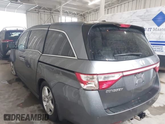 ✅ 2012 Honda Odyssey Touring • VIN: 5FNRL5H92CB106325 • Lot: 43287538. Listed on IAAI with 206,962 mi. Free auction sales archive from the USA and detailed vehicle history report at DreamBid. Image 14.