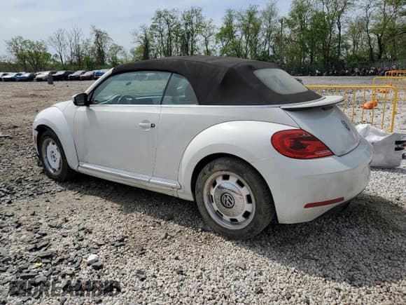 ✅ 2015 Volkswagen Beetle 1.8T w/Sound/Nav • VIN: 3VW517AT8FM817353 • Lot: 54571735. Wystawiony na Copart z przebiegiem 91 595 mil. Bezpłatny archiwum sprzedaży aukcyjnych z USA i szczegółowy raport historii pojazdu na DreamBid. Zdjęcie 2.