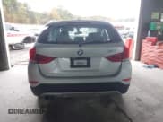 ✅ 2014 BMW X1 xDrive28i • VIN: WBAVL1C50EVY12027 • Lot: 43537124. Listed on IAAI with 84,465 mi. Free auction sales archive from the USA and detailed vehicle history report at DreamBid. Image 16.