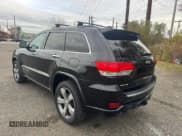 ✅ 2015 Jeep Grand Cherokee Overland • VIN: 1C4RJFCG2FC754749 • Lot: 92074455. Listed on Copart with 193,496 mi. Free auction sales archive from the USA and detailed vehicle history report at DreamBid. Image 4.