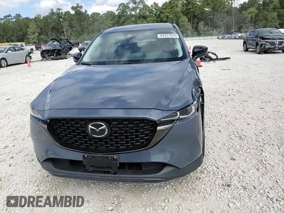 ✅ 2023 Mazda CX-5 S Preferred • VIN: JM3KFBCM1P0163968 • Lot: 87231515. Listed on Copart with 34,092 mi. Free auction sales archive from the USA and detailed vehicle history report at DreamBid. Image 14.