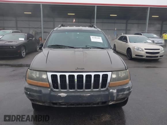 ✅ 1999 Jeep Grand Cherokee Laredo • VIN: 1J4G258S2XC768349 • Lot: 41305102. Listed on IAAI with 136,848 mi. Free auction sales archive from the USA and detailed vehicle history report at DreamBid. Image 6.