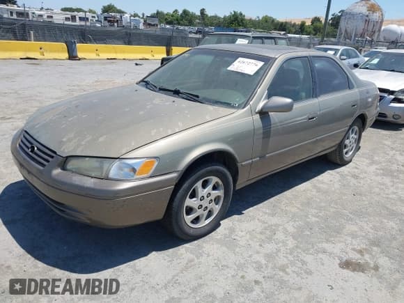 ✅ 1999 Toyota Camry LE • VIN: JT2BF22K4X0154070 • Lot: 42672776. Listed on IAAI with 228,295 mi. Free auction sales archive from the USA and detailed vehicle history report at DreamBid. Image 2.