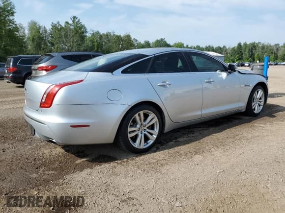 ✅ 2011 Jaguar XJ • VIN: SAJXA1CB8BLV02787 • Лот: 63916515. Опубликован ранее на Copart с пробегом 95 083 миль. Бесплатный доступ к архиву аукционных продаж из США и подробный отчёт об истории автомобиля на DreamBid. Изображение 3.