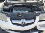 ✅ 2004 Acura MDX Touring • VIN: 2HNYD18924H530160 • Lot: 60647595. Listed on Copart with 166,783 mi. Free auction sales archive from the USA and detailed vehicle history report at DreamBid. Image 12.