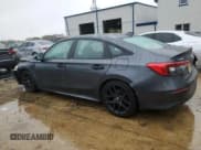 ✅ 2023 Honda Civic Sport • VIN: 2HGFE2F50PH542135 • Лот: 86258275. Опубликован ранее на Copart с пробегом 89 830 миль. Бесплатный доступ к архиву аукционных продаж из США и подробный отчёт об истории автомобиля на DreamBid. Изображение 2.