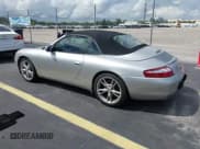 ✅ 1999 Porsche 911 • VIN: WP0CA2999XS656171 • Lot: 43280074. Wystawiony na IAAI z przebiegiem 87 973 mil. Bezpłatny archiwum sprzedaży aukcyjnych z USA i szczegółowy raport historii pojazdu na DreamBid. Zdjęcie 3.
