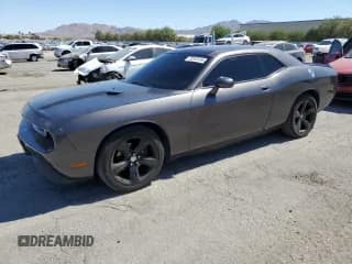 ✅ 2014 Dodge Challenger SXT • VIN: 2C3CDYAG7EH277327 • Lot: 72247414. Wystawiony na Copart z przebiegiem 158 241 mil. Bezpłatny archiwum sprzedaży aukcyjnych z USA i szczegółowy raport historii pojazdu na DreamBid. Zdjęcie 1.