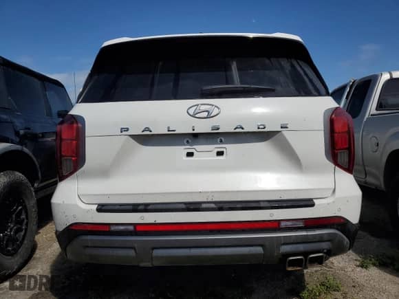 2024 Hyundai Palisade SEL z VIN KM8R24GE7RU731715, wystawiony jako Copart lot #74347094 z przebiegiem Nie podano mil oraz Nie do naprawy • Non repairable. Historia ofert i sprzedaży dostępna na DreamBid. Obrazek 6.