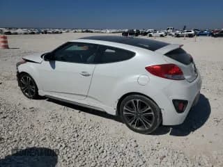 ✅ 2016 Hyundai Veloster Turbo • VIN: KMHTC6AE4GU296124 • Лот: 82507755. Опубликован ранее на Copart с пробегом 93 957 миль. Бесплатный доступ к архиву аукционных продаж из США и подробный отчёт об истории автомобиля на DreamBid. Изображение 2.