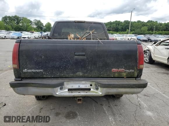 ✅ 1998 GMC Sierra 1500 • VIN: 1GTEK19R2WE559262 • Лот: 62186945. Опубликован ранее на Copart с пробегом 217 981 миль. Бесплатный доступ к архиву аукционных продаж из США и подробный отчёт об истории автомобиля на DreamBid. Изображение 6.