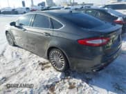 ✅ 2016 Ford Fusion Titanium • VIN: 3FA6P0K96GR300806 • Lot: 43837326. Listed on IAAI with 229,915 mi. Free auction sales archive from the USA and detailed vehicle history report at DreamBid. Image 3.