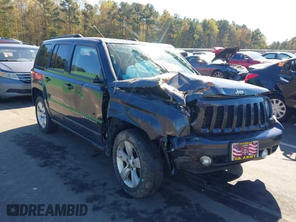 ✅ 2014 Jeep Patriot Latitude • VIN: 1C4NJRFB3ED821044 • Lot: 43503686. Listed on IAAI with 185,115 mi. Free auction sales archive from the USA and detailed vehicle history report at DreamBid. Image 1.