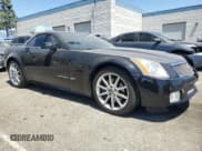 ✅ 2006 Cadillac XLR-V • VIN: 1G6YX36D565603678 • Lot: 68793655. Wystawiony na Copart z przebiegiem 35 616 mil. Bezpłatny archiwum sprzedaży aukcyjnych z USA i szczegółowy raport historii pojazdu na DreamBid. Zdjęcie 4.