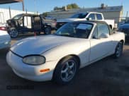 ✅ 1999 Mazda MX-5 Miata • VIN: JM1NB3535X0103235 • Lot: 43538556. Listed on IAAI with 238,235 mi. Free auction sales archive from the USA and detailed vehicle history report at DreamBid. Image 2.