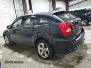 ✅ 2010 Dodge Caliber SXT • VIN: 1B3CB4HA1AD662757 • Лот: 81899934. Опубликован ранее на Copart с пробегом 128 801 миль. Бесплатный доступ к архиву аукционных продаж из США и подробный отчёт об истории автомобиля на DreamBid. Изображение 2.