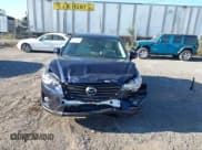 ✅ 2016 Mazda CX-5 Grand Touring • VIN: JM3KE4DY0G0797868 • Lot: 43380106. Wystawiony na IAAI z przebiegiem 121 171 mil. Bezpłatny archiwum sprzedaży aukcyjnych z USA i szczegółowy raport historii pojazdu na DreamBid. Zdjęcie 13.