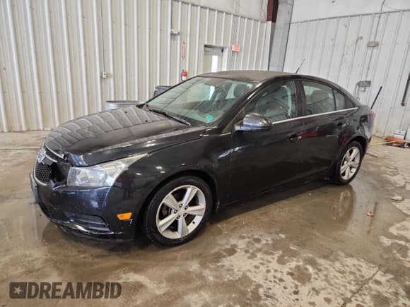 ✅ 2014 Chevrolet Cruze 2LT • VIN: 1G1PE5SB2E7398914 • Lot: 86634495. Listed on Copart with 173,118 mi. Free auction sales archive from the USA and detailed vehicle history report at DreamBid. Image 1.