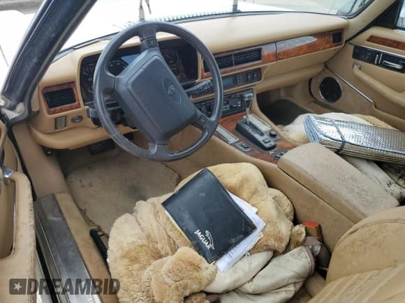 ✅ 1994 Jaguar XJS • VIN: SAJNX2747RC191550 • Лот: 74452804. Опубликован ранее на Copart с пробегом Не указан. Бесплатный доступ к архиву аукционных продаж из США и подробный отчёт об истории автомобиля на DreamBid. Изображение 8.