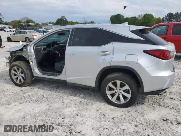 ✅ 2016 Lexus RX 350 • VIN: 2T2BZMCA4GC020161 • Lot: 52846525. Listed on Copart with 154,391 mi. Free auction sales archive from the USA and detailed vehicle history report at DreamBid. Image 2.