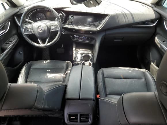 ✅ 2023 Buick Envision Essence • VIN: LRBFZNR4XPD061716 • Lot: 62034995. Listed on Copart with 59,328 mi. Free auction sales archive from the USA and detailed vehicle history report at DreamBid. Image 8.