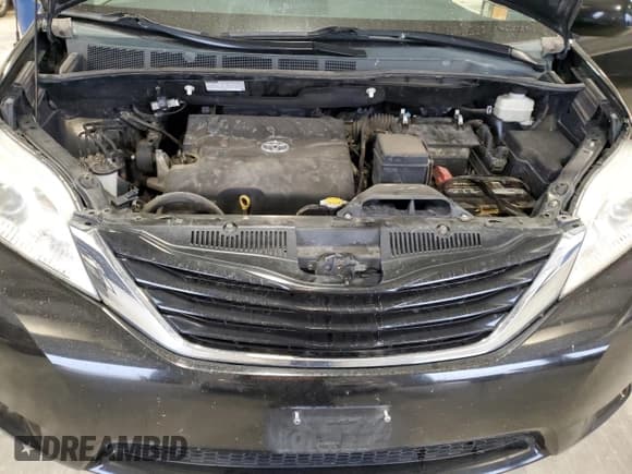 ✅ 2013 Toyota Sienna LE • VIN: 5TDKK3DC8DS282464 • Lot: 90034475. Listed on Copart with 122,791 mi. Free auction sales archive from the USA and detailed vehicle history report at DreamBid. Image 12.