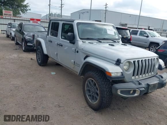 ✅ 2023 Jeep Gladiator Overland • VIN: 1C6HJTFG9PL523216 • Lot: 42962212. Listed on IAAI with Not provided. Free auction sales archive from the USA and detailed vehicle history report at DreamBid. Image 1.