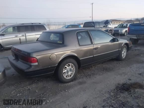 ✅ 1989 Mercury Cougar • VIN: 1MEPM6045KH628955 • Lot: 41144850. Listed on IAAI with 112,436 mi. Free auction sales archive from the USA and detailed vehicle history report at DreamBid. Image 4.