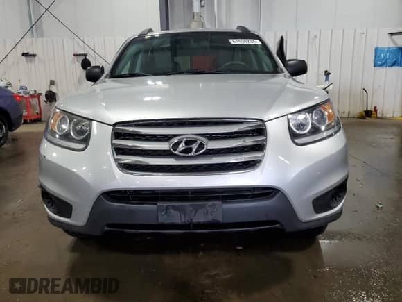 2012 Hyundai Santa Fe GLS with VIN 5XYZGDAB8CG119715, listed as a Copart auction lot 61458234 with 140,378 mi miles and Salvage title. Bid and sale history available at DreamBid. Image 5.