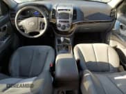 ✅ 2012 Hyundai Santa Fe SE • VIN: 5XYZHDAG9CG150156 • Lot: 80063364. Listed on Copart with 105,370 mi. Free auction sales archive from the USA and detailed vehicle history report at DreamBid. Image 8.