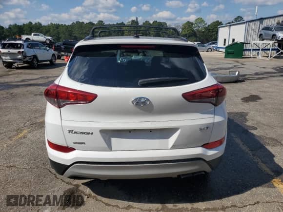 2017 Hyundai Tucson Sport z VIN KM8J33A24HU557040, wystawiony jako Copart lot #85887885 z przebiegiem 113 488 mil mil oraz Szkoda całkowita • Salvage title. Historia ofert i sprzedaży dostępna na DreamBid. Obrazek 6.