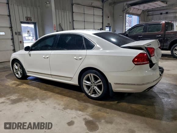 ✅ 2015 Volkswagen Passat SEL Premium • VIN: 1VWCV7A30FC064365 • Lot: 94863385. Listed on Copart with 157,156 mi. Free auction sales archive from the USA and detailed vehicle history report at DreamBid. Image 2.