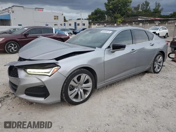 ✅ 2022 Acura TLX Technology • VIN: 19UUB5F48NA005341 • Лот: 88958615. Опубликован ранее на Copart с пробегом 27 368 миль. Бесплатный доступ к архиву аукционных продаж из США и подробный отчёт об истории автомобиля на DreamBid. Изображение 1.