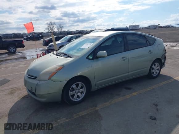 ✅ 2006 Toyota Prius • VIN: JTDKB20U167525585 • Lot: 41680223. Listed on IAAI with 324,041 mi. Free auction sales archive from the USA and detailed vehicle history report at DreamBid. Image 2.
