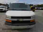 2014 Chevrolet Express Passenger LT z VIN 1GAZG1FG2E1202457, wystawiony jako Copart lot #82704884 z przebiegiem 142 982 mil mil oraz Szkoda całkowita • Salvage title. Historia ofert i sprzedaży dostępna na DreamBid. Obrazek 5.