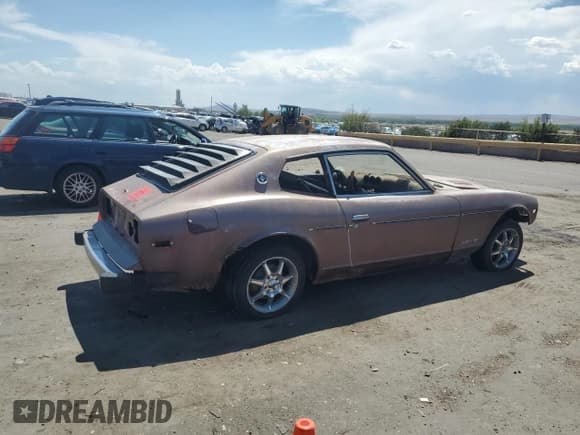 ✅ 1977 Datsun 280ZX • VIN: GHLS30061193 • Лот: 65964485. Опубликован ранее на Copart с пробегом Не указан. Бесплатный доступ к архиву аукционных продаж из США и подробный отчёт об истории автомобиля на DreamBid. Изображение 3.