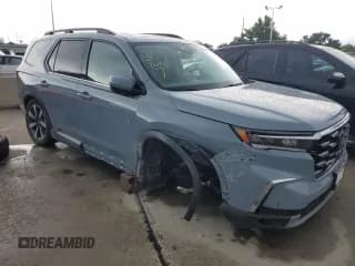 ✅ 2023 Honda Pilot Elite • VIN: 5FNYG1H81PB021501 • Lot: 60779753. Wystawiony na Copart z przebiegiem 3 259 mil. Bezpłatny archiwum sprzedaży aukcyjnych z USA i szczegółowy raport historii pojazdu na DreamBid. Zdjęcie 4.