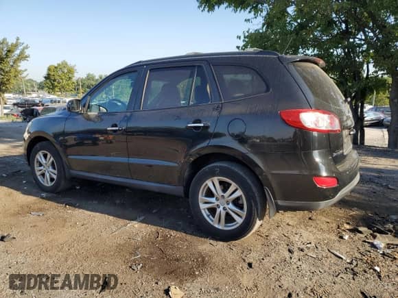 2012 Hyundai Santa Fe Limited с VIN 5XYZK4AG5CG141536, выставлен на аукционе Copart как лот 70818284 с пробегом 151 235 миль миль и Списание • Salvage title. История ставок и продаж доступна на DreamBid. Изображение 2.