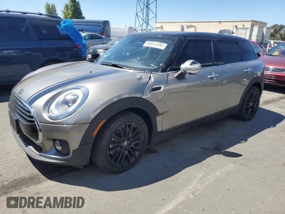 ✅ 2016 MINI Clubman • VIN: WMWLN5C54G2B28372 • Lot: 69594604. Listed on Copart with 34,403 mi. Free auction sales archive from the USA and detailed vehicle history report at DreamBid. Image 1.