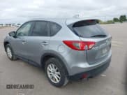 ✅ 2014 Mazda CX-5 Touring • VIN: JM3KE4CY4E0380252 • Lot: 43510717. Wystawiony na IAAI z przebiegiem 207 051 mil. Bezpłatny archiwum sprzedaży aukcyjnych z USA i szczegółowy raport historii pojazdu na DreamBid. Zdjęcie 3.